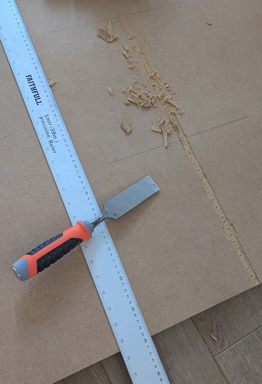 Chiselling the groove in the base.
